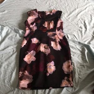 Sleeveless cocktail dress worn once to a wedding.